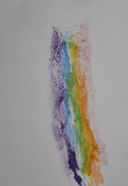 labia print of rainbow colors on white paper