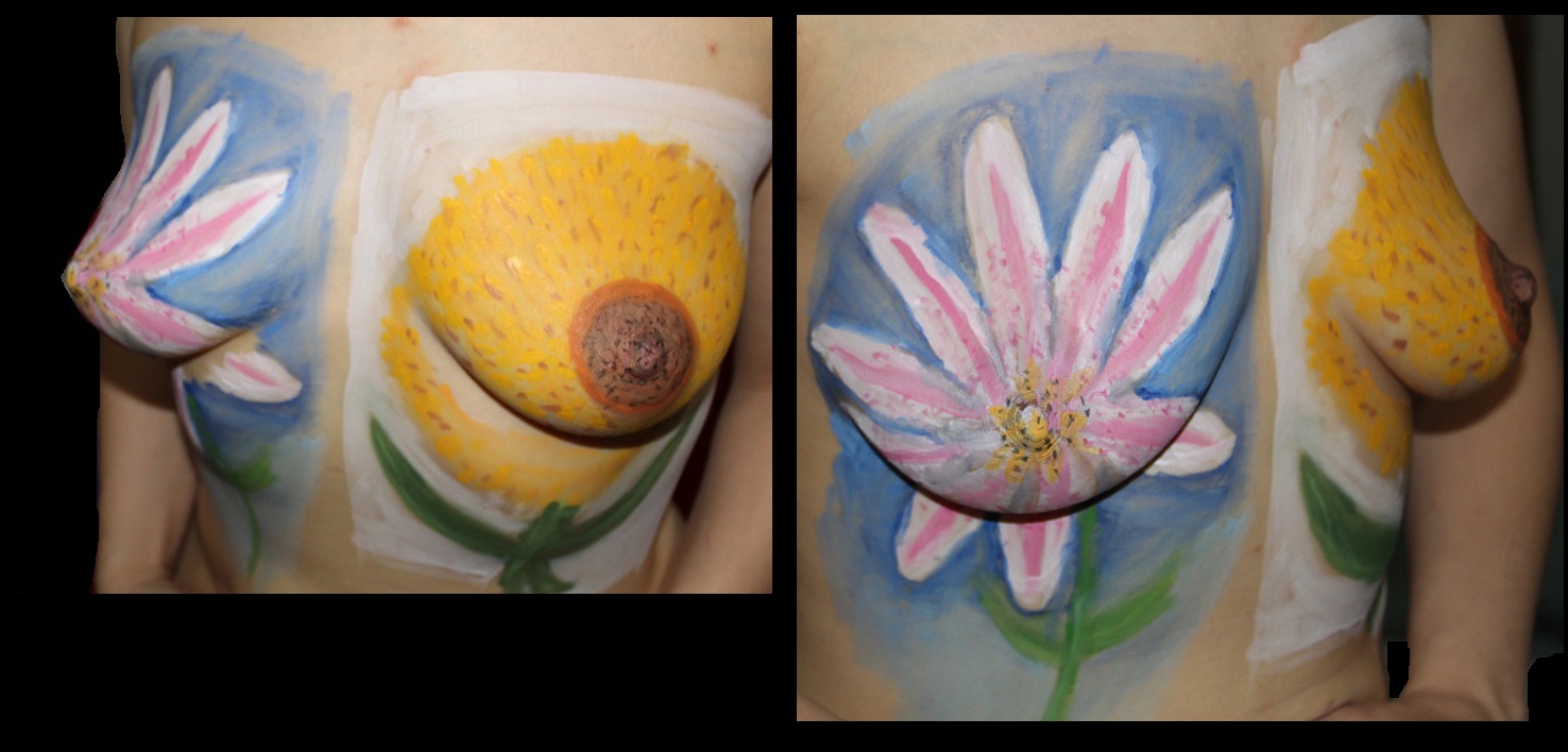 pink flower on her right breast and yellow flower on the left