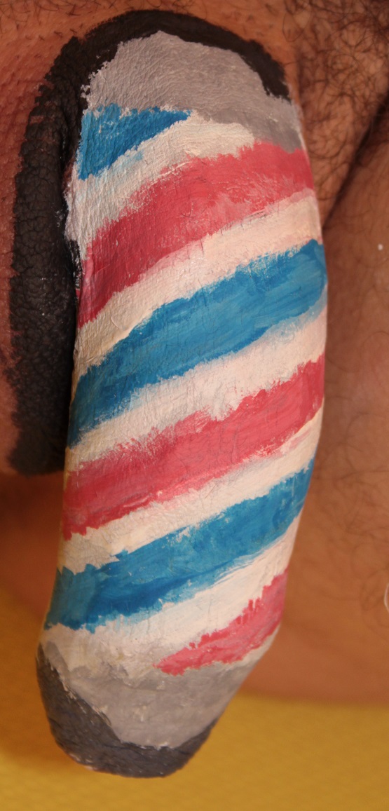Body painting of barber pole on penis