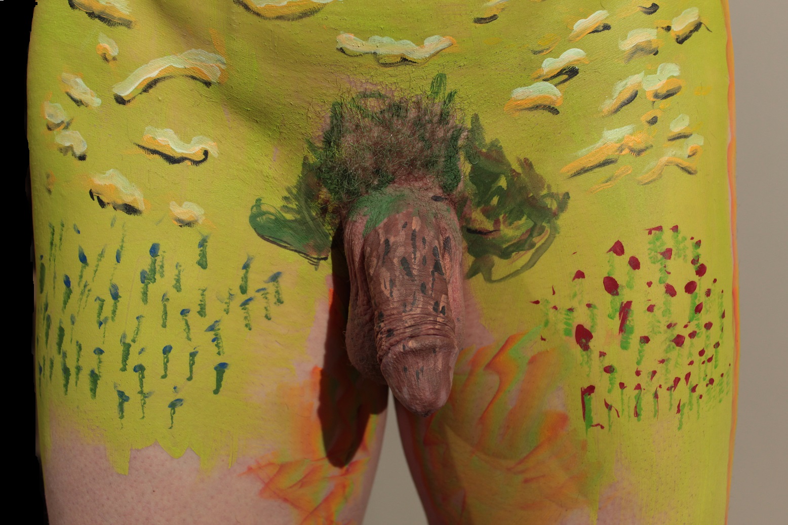 Body painting of apple tree on penis