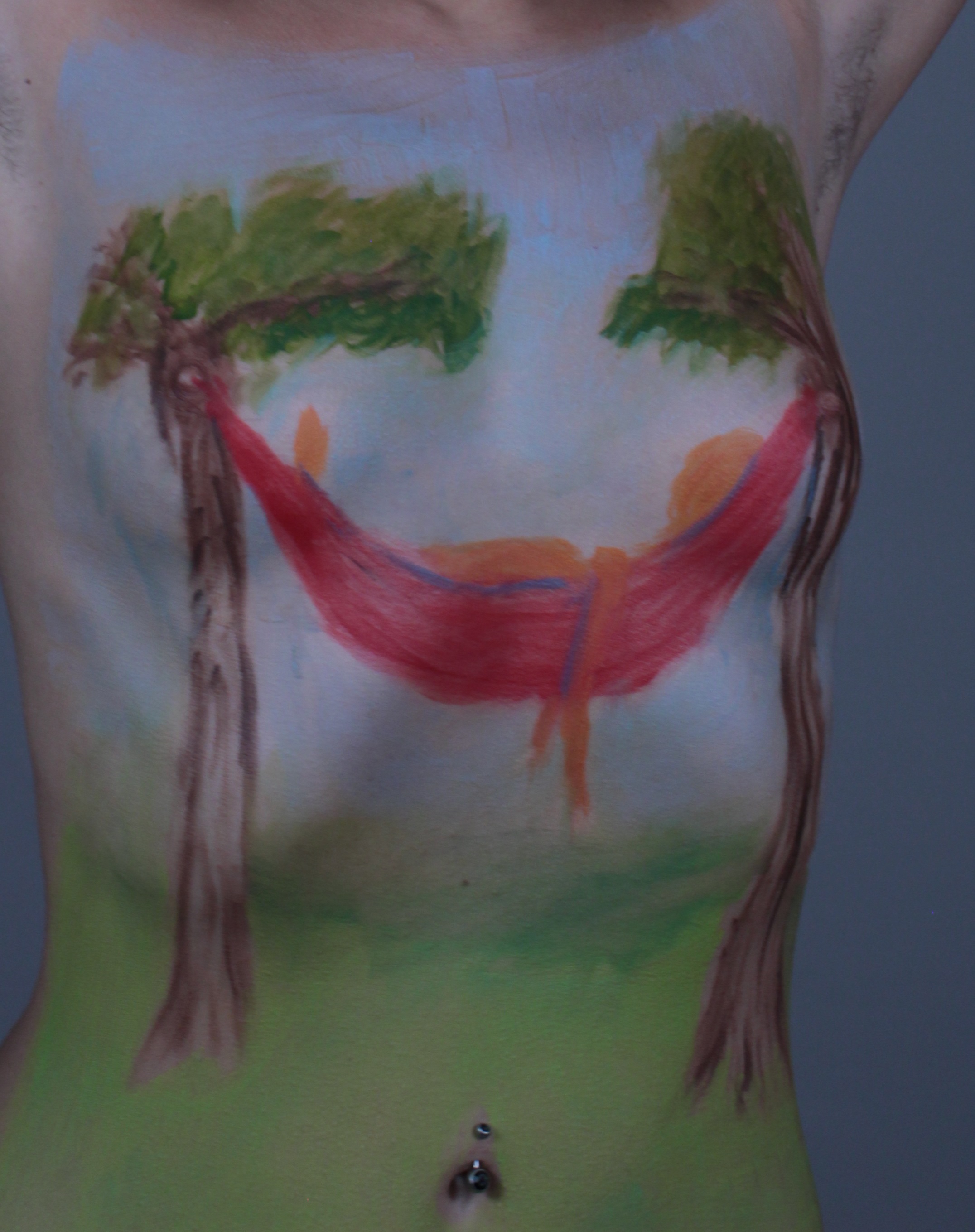 painting of person resting in hammock between two trees on woman's torso
