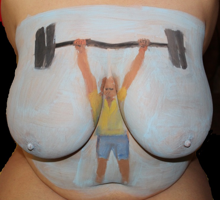 painting of weight lifter painted on woman's chest