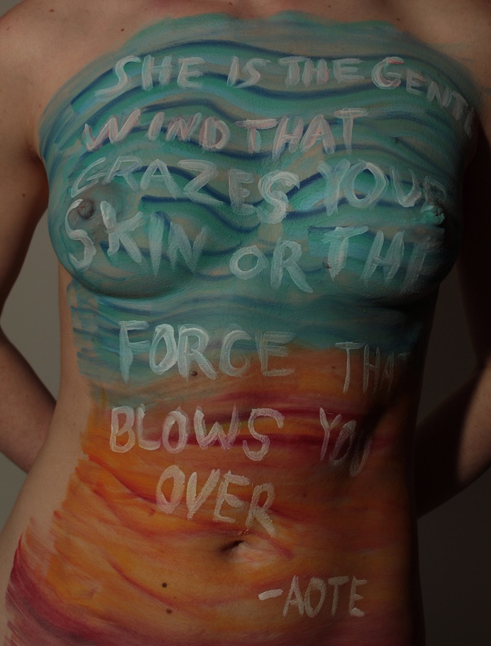 model with poem written on her torso
