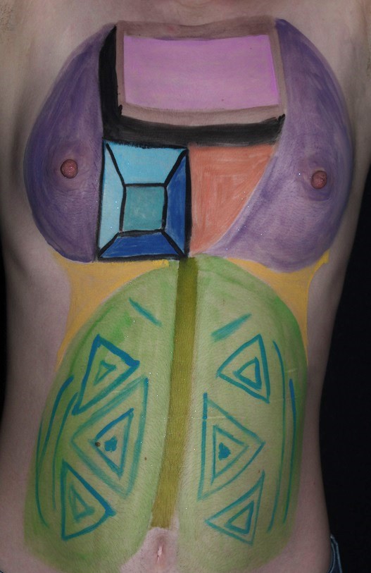 variety of shapes in various colors on woman's torso