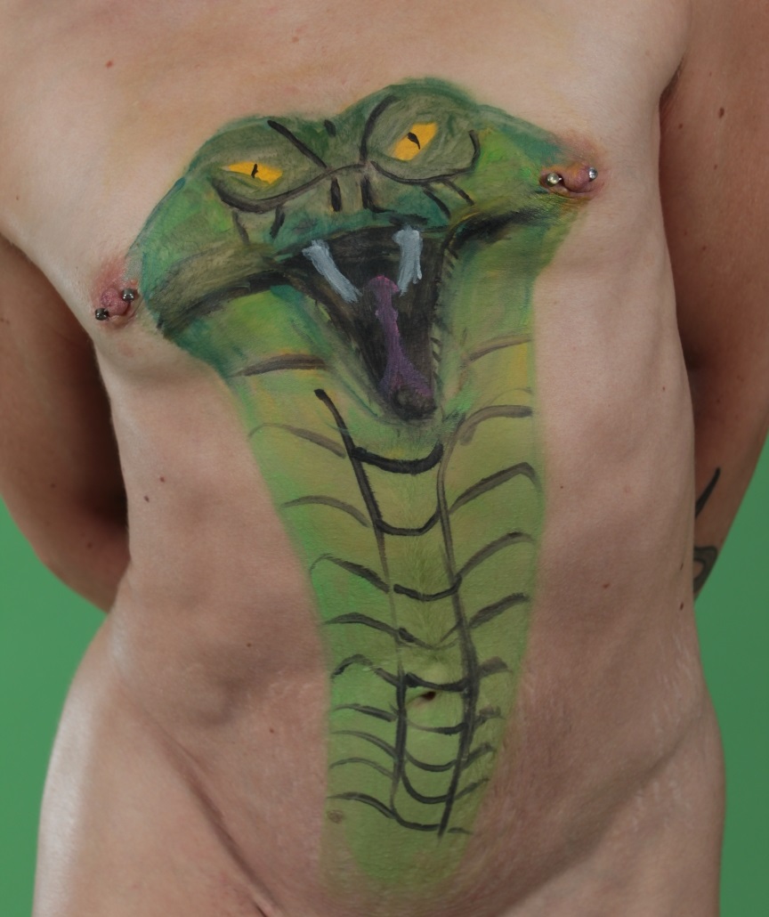 nude female with snake body painted on her chest