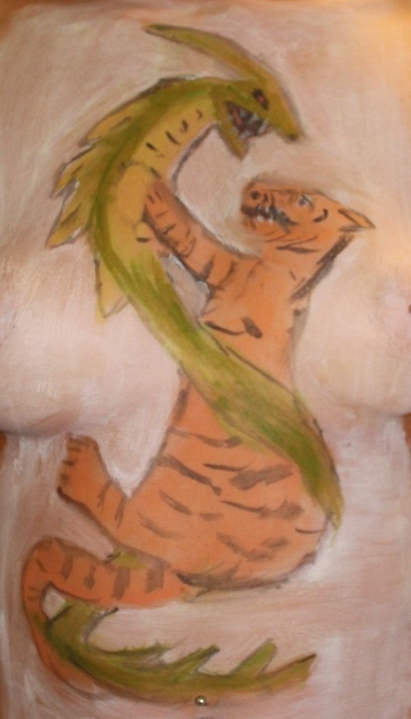 painting of dragon wrestling a tiger on a woman's torso