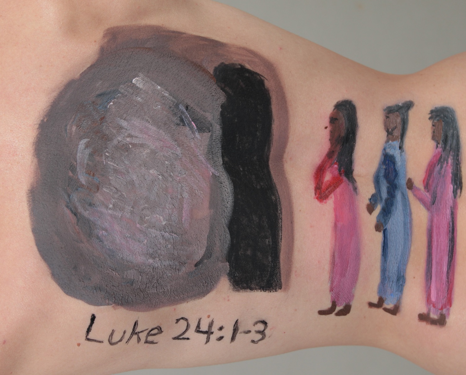 painting of Mary Magdalene, Mary (mother of James) and third woman, visiting the empty tomb, on model's back