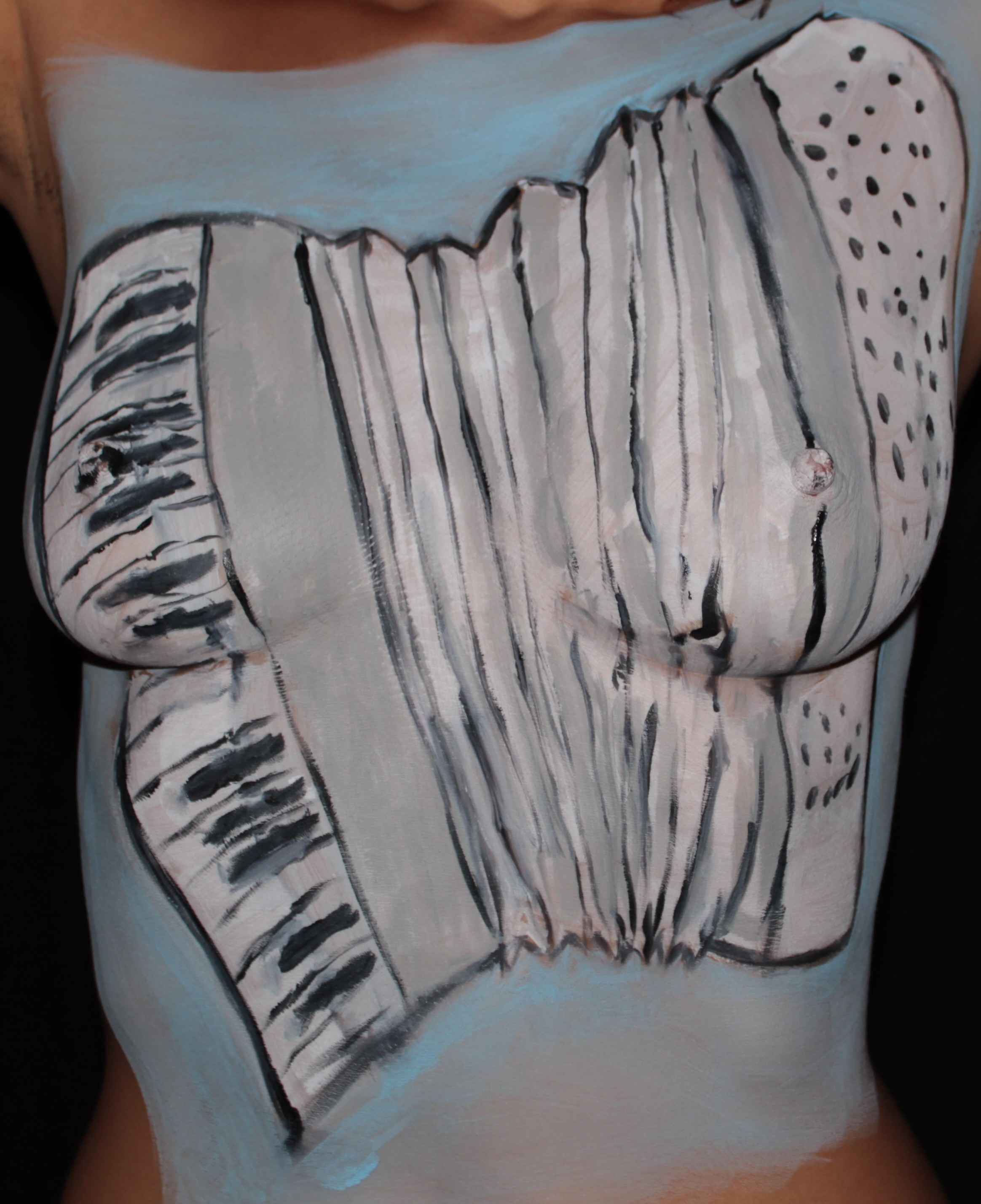 accordion painted on model's torso