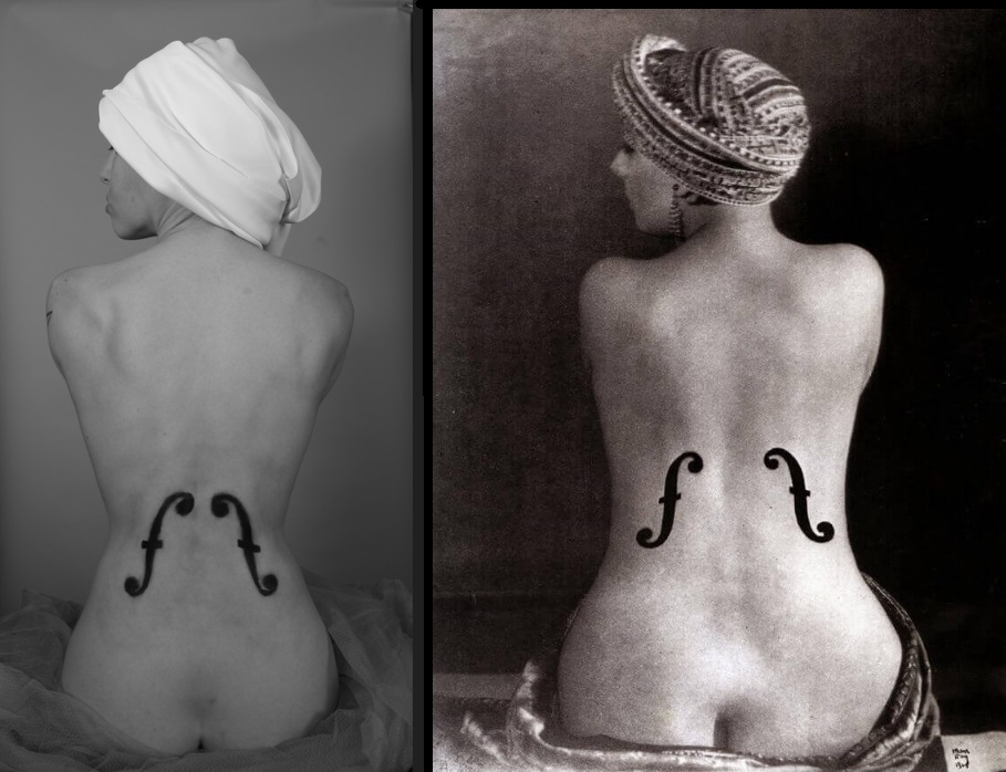 violin F holes painted on model's back next to photo of original 1922 photograph of same