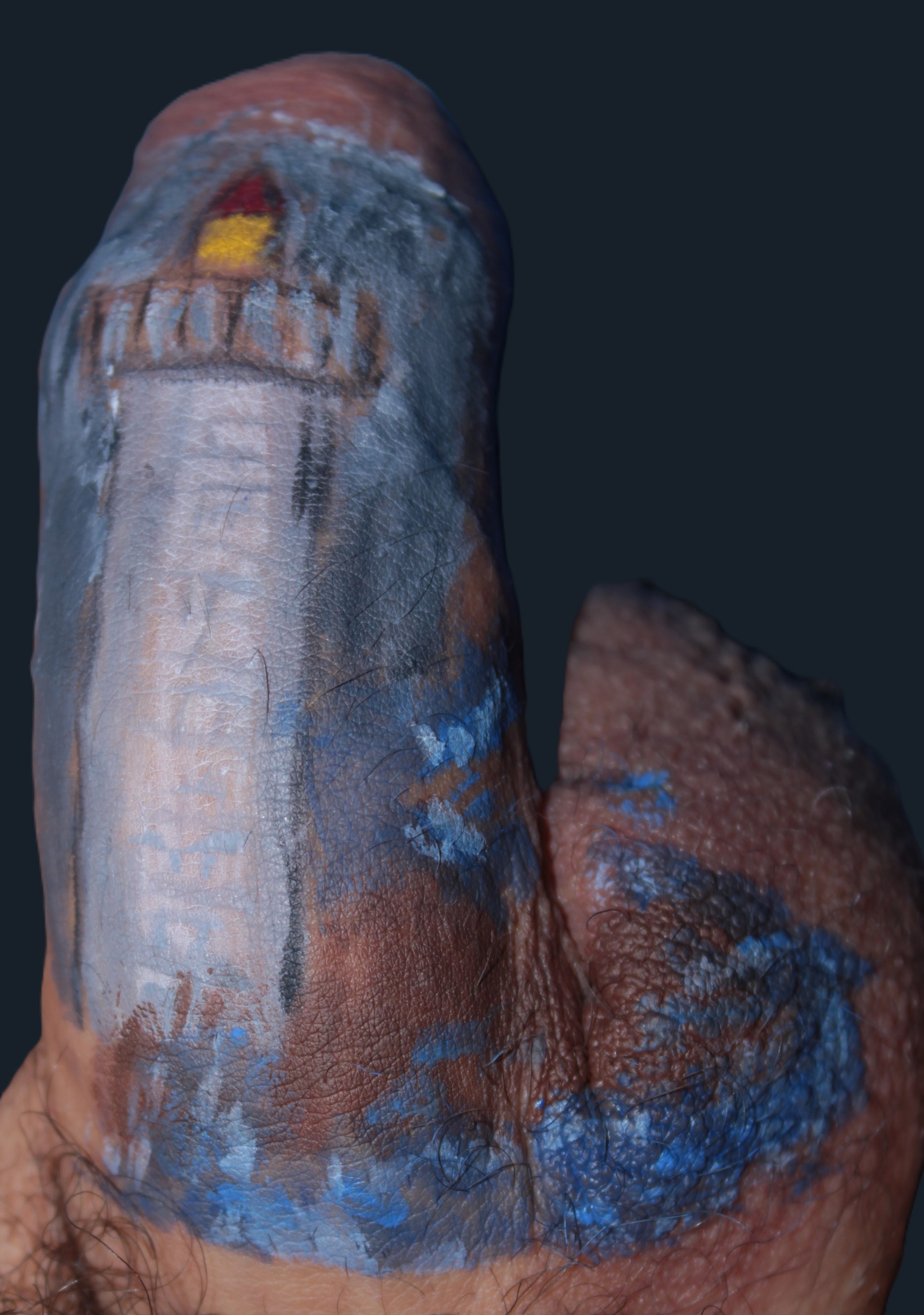 body painting of a lighthouse on a penis